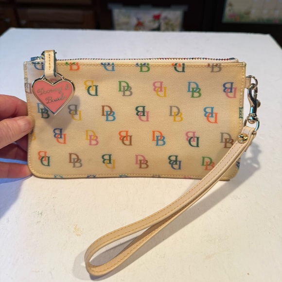 Dooney & Bourke Handbags - Dooney & Bourke Cream Multicolor Monogram Canvas Coated Leather Wristlet